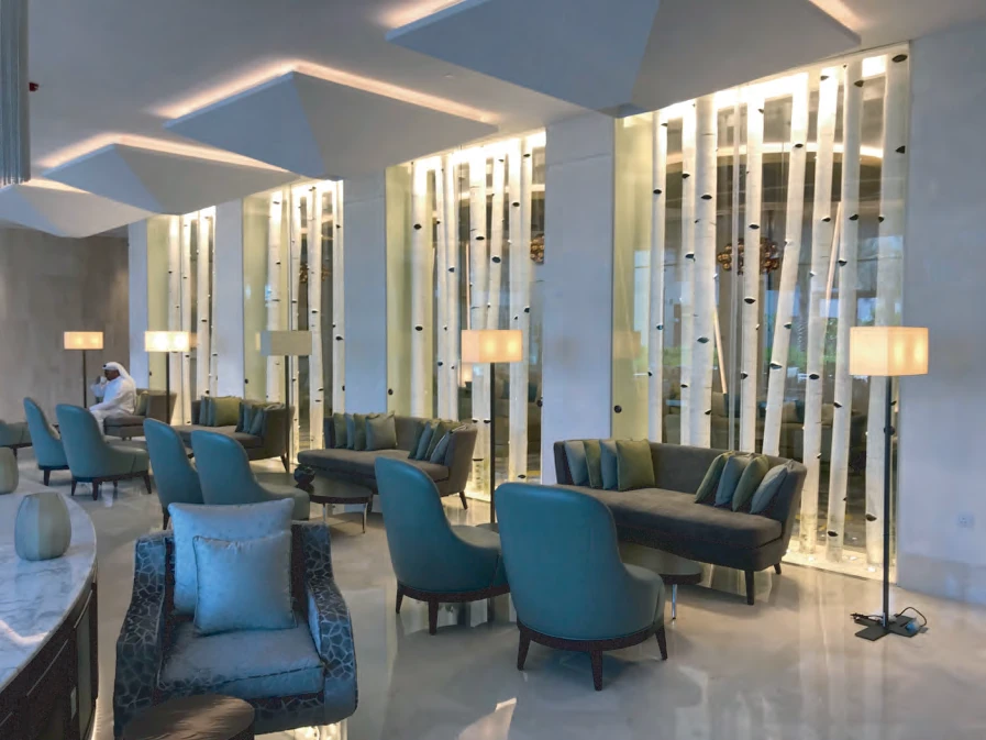 Birch-tree screens seen across the Amwaj Lounge seating