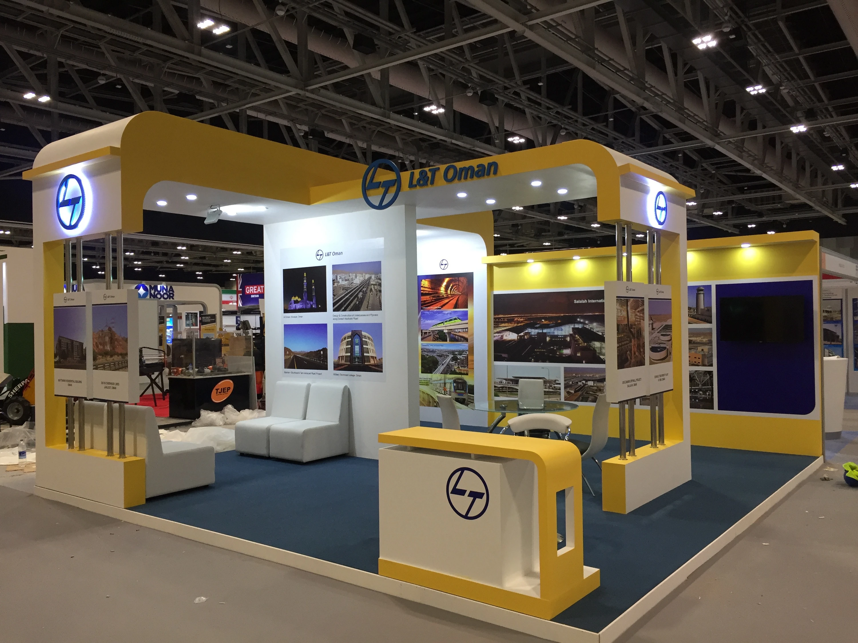L&T Oman exhibition stand, full view with reception and project walls